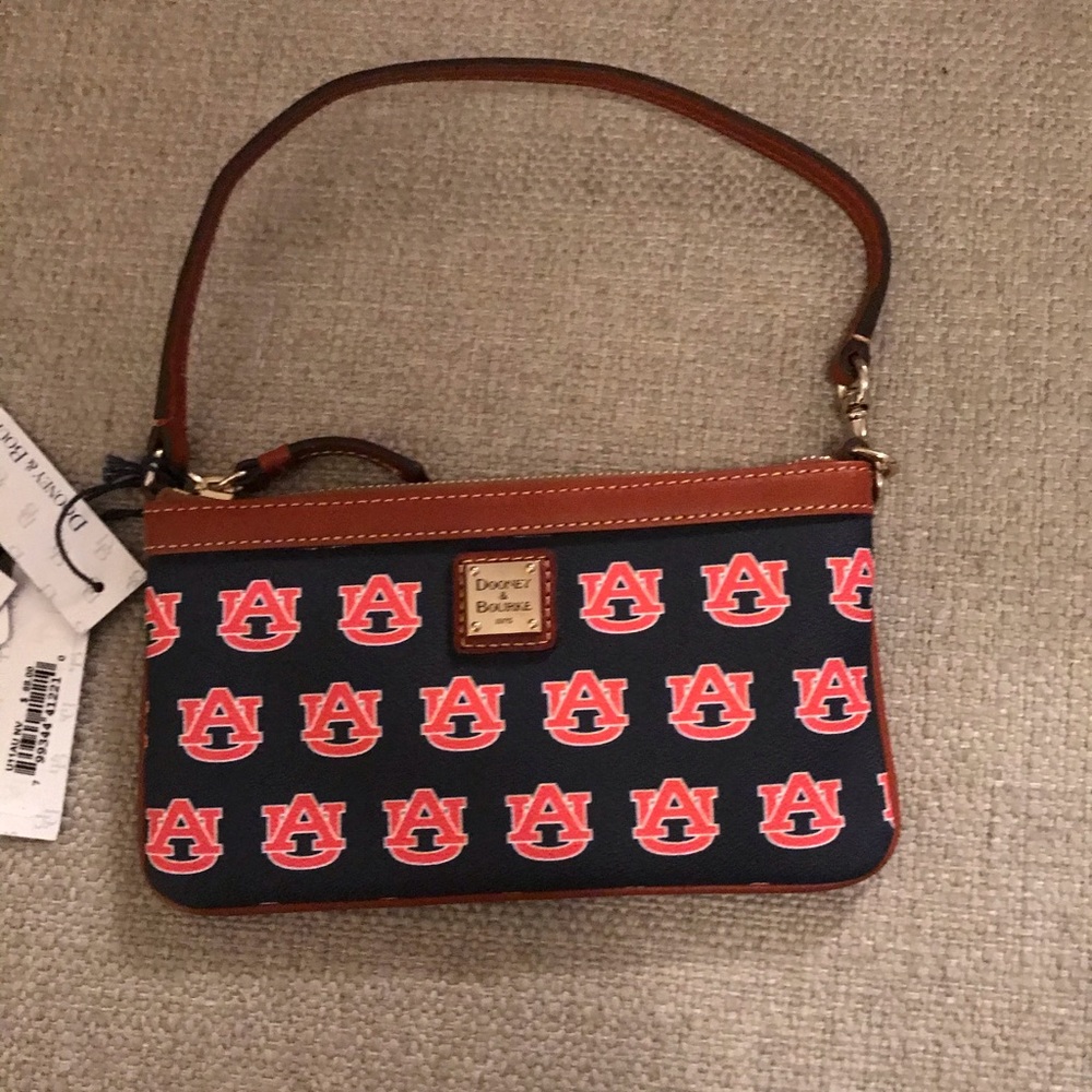 Authentic Dooney and Bourke Auburn wristlet